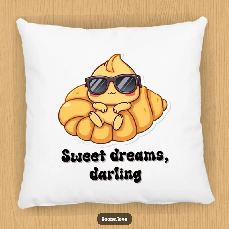 Funny Scone Croissant Pillow: A scone character in sunglasses lounges on a large croissant, bringing humorous comfort and style.