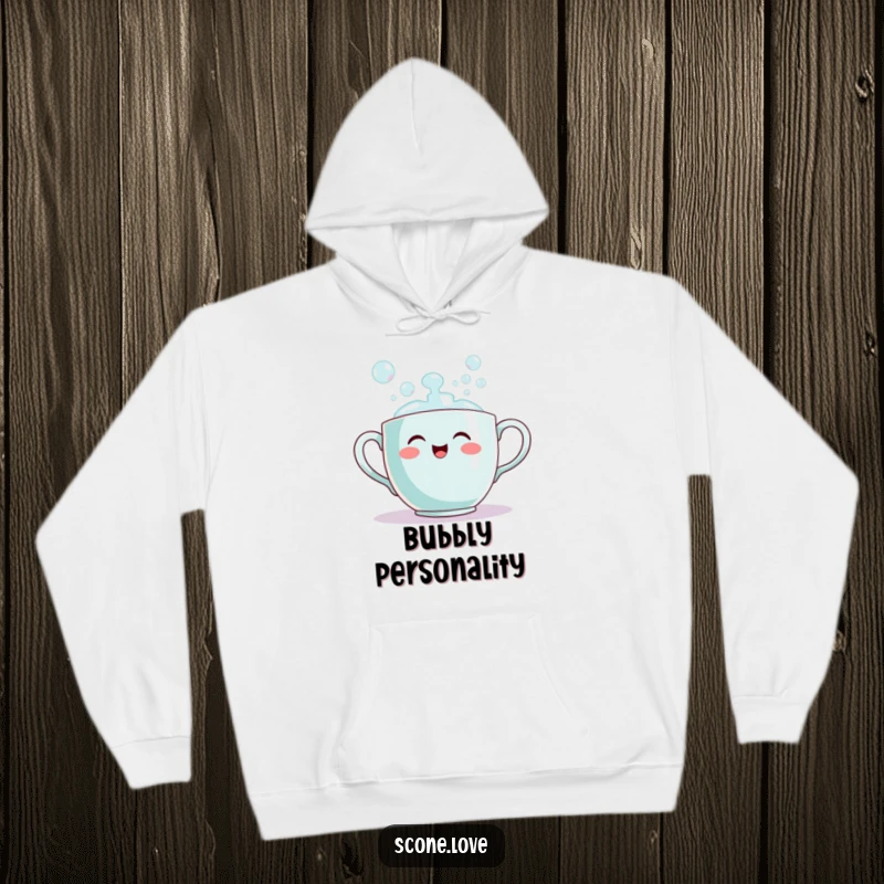 Funny teacup hoodie showing a smiling teacup enthusiastically pouring out bubbles, perfect for staying warm and feeling cheerful.