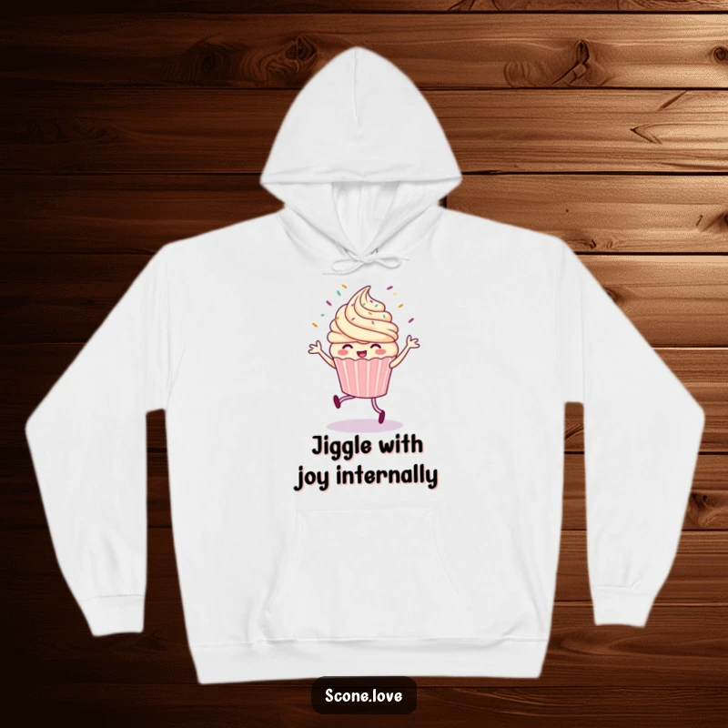 Funny hoodie with a whimsical cupcake executing a lively jig, surrounded by a vibrant shower of sprinkles, radiating pure joy.