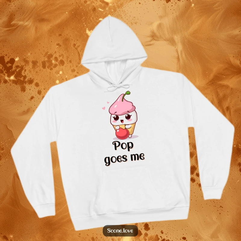 Funny Scone Surprise Hoodie: A scone character looks surprised by a cherry popping playfully, offering a humorous and cozy feel.