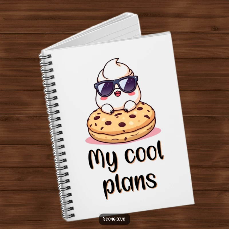Funny Kawaii Scone wearing sunglasses, relaxing on a giant cookie, on a notebook cover for cool notes.
