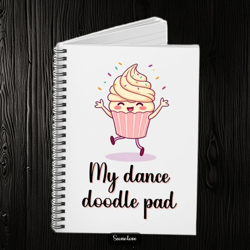 Funny notebook cover with a playful cupcake doing a jig, surrounded by a delightful scattering of sprinkles, inspiring creative thoughts.